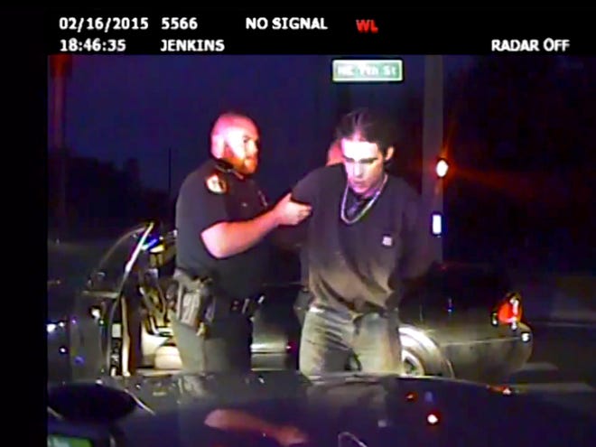 This still image from an on-dash video camera shows the arrest of Chandler Wayne Neal on Monday.