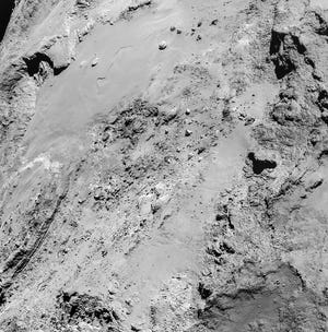 On Saturday, the Rosetta probe passed within four miles of the Comet 
67P/Churyumov–Gerasimenko, seen here in a four-image mosaic.AP PHOTO / ESA / 
ROSETTA / NAVCAM