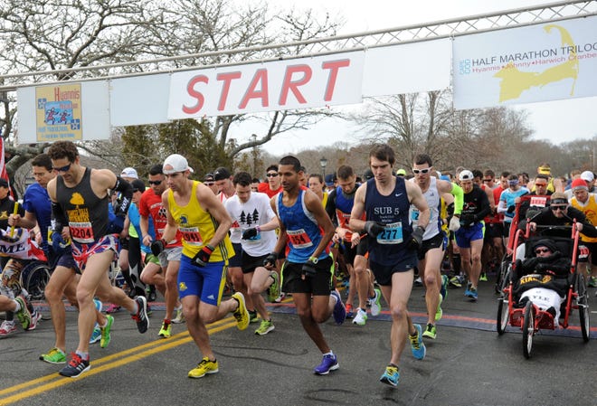 About 4,600 runners participated in the Hyannis Marathon last February. This weekend's events were canceled because of unsafe, snow-choked roads. Christine Hochkeppel file/Cape Cod Times