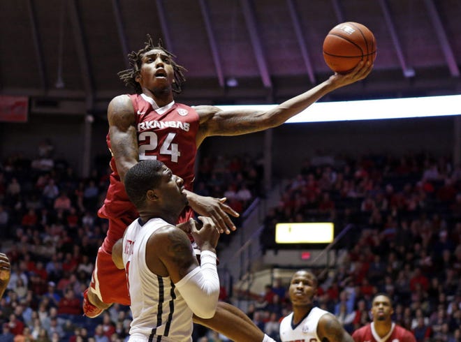 Arkansas guard Michael Qualls (24) had no trouble scoring over Martavious Newby in Saturday's 71-70 victory at Mississippi. But he did struggle to find success against Missouri with Wes Clark guarding him on Jan. 24, going 3 for 15 from the field. The Tigers will have to try to slow him down again, this time without Clark, when they meet the Razorbacks again at 8 p.m. Wednesday.