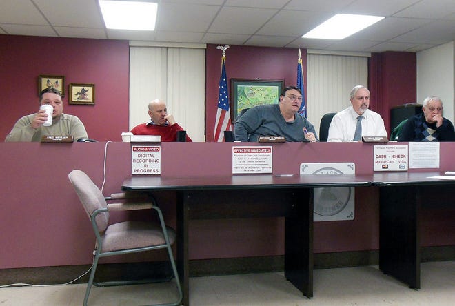 Herkimer Mayor Tony Brindisi, center, responded during Tuesday's board meeting to criticism about the village's dealings with the county. Also shown are, from left, Trustees Fred Weisser, Greg Malta, Kelly Brown and Harold Stoffolano. TIMES PHOTO/DONNA THOMPSON