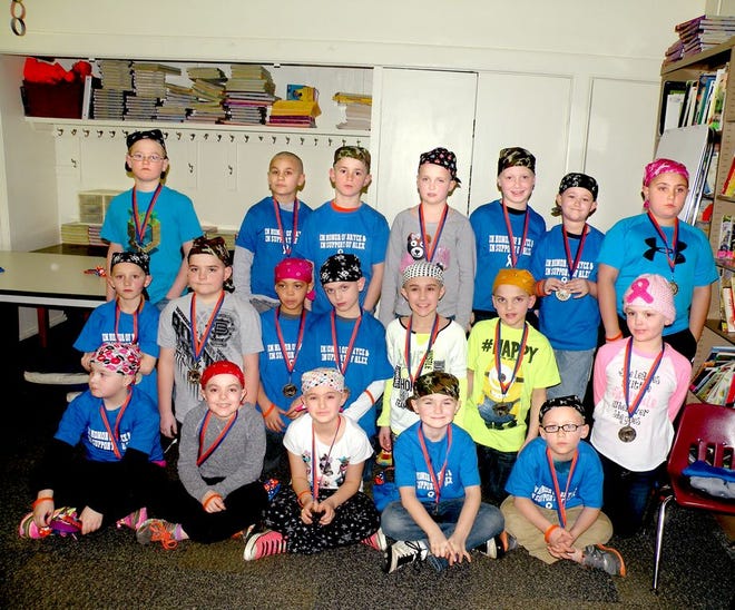 Third-graders at Fieldcrest South Elementary in Minonk had their heads shaved this week as a show of support to classmates Alex McKay and Brandon Hale, who have lost hair while undergoing treatment for tumors. Earlier this year, Alex's twin, Bryce McKay, died from a brain tumor.
