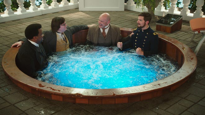 From left, Craig Robinson, Clark Duke, Rob Corddry and Adam Scott appear in the movie "Hot Tub Time Machine 2."