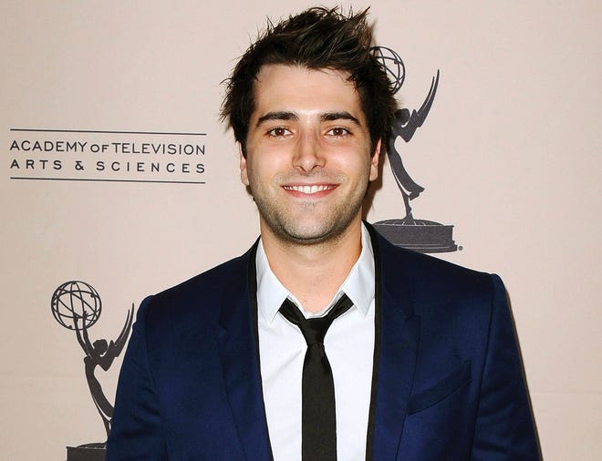 FILE - In this June 13, 2013 file photo, actor Freddie Smith arrives at the 40th Annual Daytime Emmy Awards nominee reception in Beverly Hills, Calif. Smith has been sentenced to two years of probation and had his drivers’ license suspended for a year after pleading guilty to charges stemming from a car crash that seriously injured his girlfriend. (Photo by Scott Kirkland/Invision/AP, File)