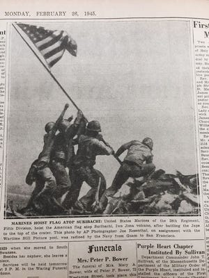 A page from The Herald News on Monday, Feb. 26, 1945, shows Joe Rosenthal's iconic photo from the Battle of Iwo Jima.