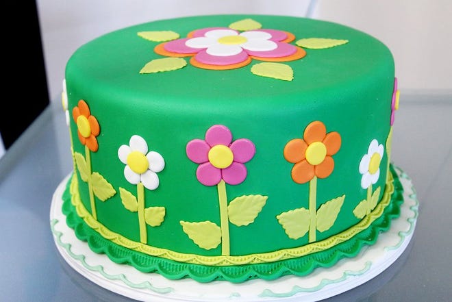 A cake is decorated with Satin Fine Foods' fondant.
