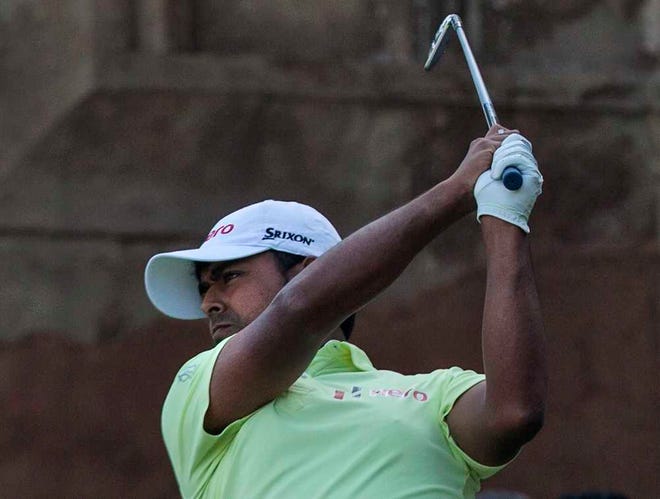 India's Anirban Lahiri tees off during the Hero Indian Open Golf at the Delhi Golf Club in New Delhi, India, Sunday, Feb. 22, 2015.Lahiri grabbed his second European Tour title as he beat overnight leader Shiv Chowrasia on the first playoff hole on Sunday. (AP Photo/Tsering Topgyal)
