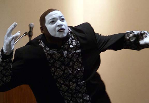 Mime Tyrone Brown performs Sunday during a Black History Month program at the New Bern-Craven County Public Library.