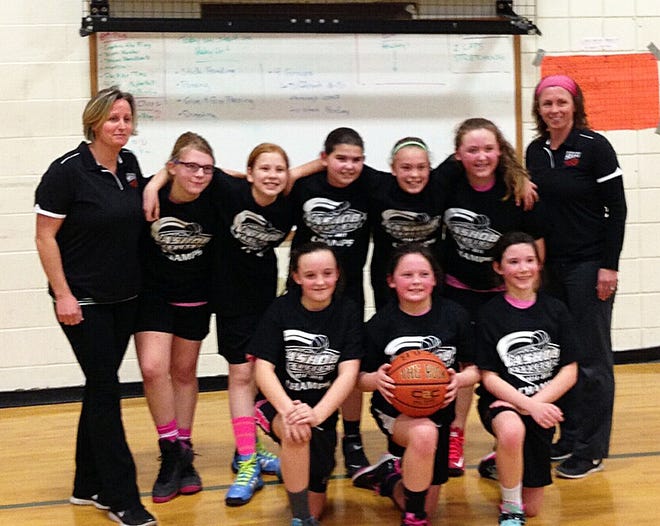 The Clinton Fizz grades 5/6 girls basketball team recently won its divisional championship in the Nashoba Youth Basketball League. They are (front, from left) Madison Keenan, Riley Michaud and Kylie Mayne; and (back, from left) coach Erin Winn Keenan, Anneliese Chase, Nina Gavin, Rachel Guinn, Ella Chouinard, Jackie Healey and coach Meegan Garrity Turini.