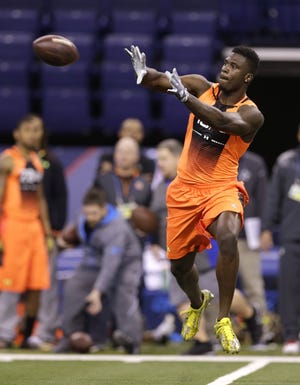 Dorial Green-Beckham of Missouri showed off first-round talent as a receiver at the NFL combine, but it’s his off-field issues that has teams wary. DAVID J. PHILLIP/THE ASSOCIATED PRESS