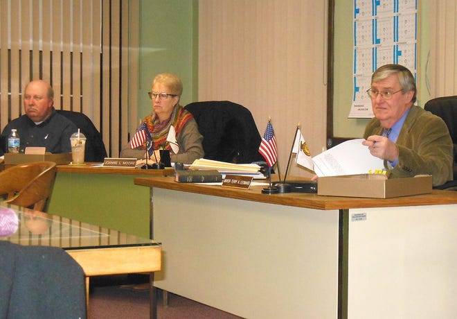 Ilion village board members listen to comments during a meeting earlier this month. Mayor Terry Leonard issued a reminder regarding water service. “The village of Ilion is reminding residents that the continued sub-zero temperatures are driving the frost line deeper into the ground each day and our water department is getting calls daily about frozen residential water lines,” he said Thursday. Shown from left are Trustees Kalman Socolof and Joanne Moore and Leonard. TELEGRAM FILE PHOTO