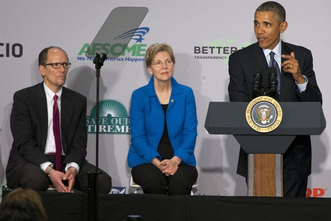 Labor Secretary Tom Perez, left, and Sen. Elizabeth Warren, D-Mass., listen as President Barack Obama speaks at AARP in Washington, Monday, Feb. 23, 2015. President Barack Obama says too few Americans approaching retirement have saved enough to have peace of mind during their later years. (AP Photo/Jacquelyn Martin)