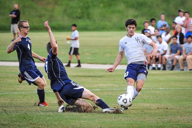 Hunter Huss senior Seth Jones, right, landed an East-West All-Star Soccer Game invitation after finishing his four-year career as Gaston County's all-time leading scorer.