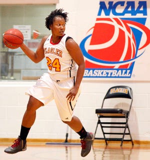 DARON.DEAN@STAUGUSTINE.COM Flagler's Treva Mason moves the ball up the court during women's NCAA basketball against Montevallo in Flagler's gymnasium Saturday afternoon, February 21, 2015.