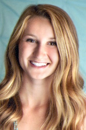 Macomb High School senior three-sport athlete Zoe Lambert