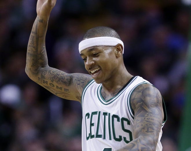 Celtics guard Isaiah Thomas smiles during the fourth quarter of Boston's 115-94 win over the Knicks on Wednesday night.