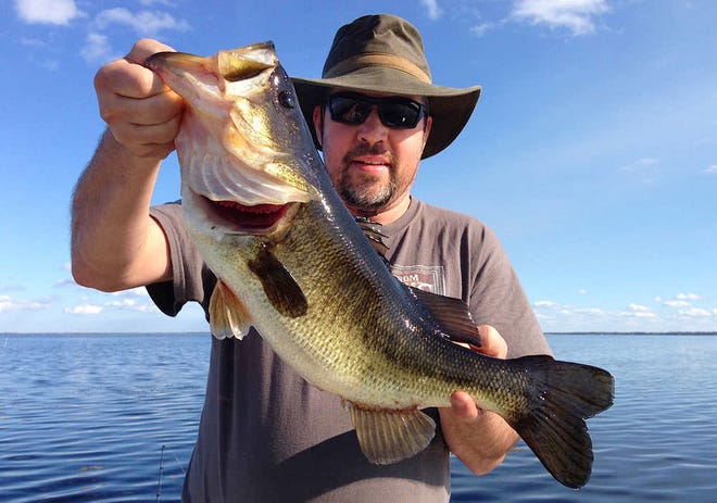 CONTRIBUTED Ohio's George Opria spent a week on Lake George recently, chasing bass with little success. On his last day he booked a trip with guide, Adam Delaney, out of Georgetown Marina. The result was a story to take home. The 11-pound largemouth bass hit a bull minnow.