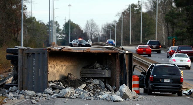 A one vehicle accident in the northbound lane of Highway 82 on the Woolsey Finnell Bridge left the driver of a dump truck dead on Tuesday Feb. 24, 2015 in Tuscaloosa, Ala. staff photo | Robert Sutton