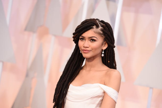Zendaya arrives at the Oscars on Sunday, Feb. 22, 2015, at the Dolby Theatre in Los Angeles. (Photo by Jordan Strauss/Invision/AP)