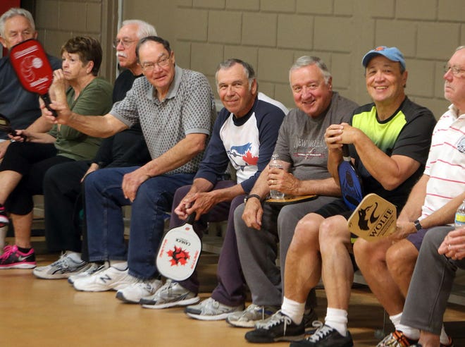 Pickleball players wait for their games to start at the Frank Brown Park gym in Panama City Beach last week.