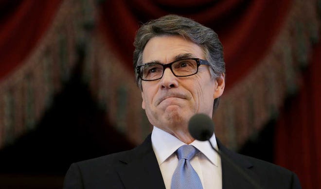 Former Gov. Rick Perry addresses a joint session of the Texas Legislature, in Austin on Jan. 15, 2015. Attorneys for Perry have asked a Texas appeals court to dismiss felony charges against the possible 2016 presidential candidate on free speech grounds, arguing that what's "at stake is not just the freedom of one man."