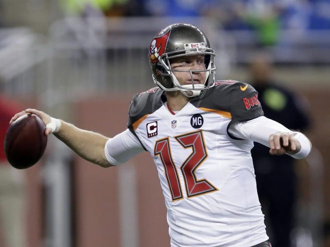 In this Dec. 7, 2014, file photo, Tampa Bay Buccaneers quarterback Josh McCown throws during an NFL football game against the Detroit Lions in Detroit. The Browns have agreed to terms with veteran quarterback McCown on a contract. McCown, who went 1-10 as Tampa Bay's starter last season, reached agreement with Cleveland on Friday, Feb. 27, 2015. The 35-year-old had also been in contract talks with the Buffalo Bills.