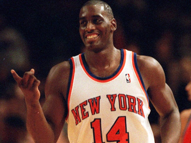 In this Dec. 3, 1995 file photo, New York Knicks Anthony Mason runs down court during an NBA basketball game against the Washington Bullets in New York. The New York Knicks spokesman Jonathan Supranowitz confirmed Saturday, Feb. 28, 2015 that Mason, a rugged power forward who was a defensive force for several NBA teams in the 1990s, has died. He was 48. (AP Photo/Ron Frehm)