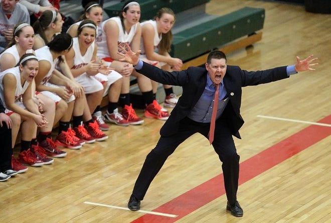 Morton girls basketball coach Bob Becker coaches up the Potters during last week's Class 3A sectional title victory over Galesburg.