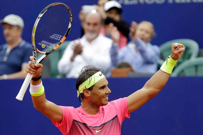 Rafael Nadal of Spain celebrates winning the final tennis match at the ATP Argentina Open against Juan Monaco of Argentina in Buenos Aires, Argentina, Sunday, March 1, 2015. Nadal won 6-4, 6-1. (AP Photo/Victor R. Caivano)