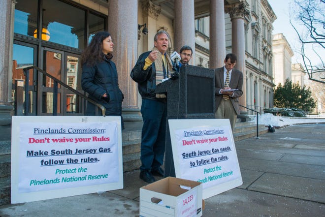 (File) Jeff Tittle, director of the New Jersey Sierra Club, speaks at a news conference on behalf of a coalition of environmental groups on the steps of the New Jersey Statehouse in Trenton, on Wednesday, December 18, 2013. The group delivered a petition for Gov. Chris Christie and the Pinelands Commission voicing opposition to the proposed South Jersey Gas pipeline.