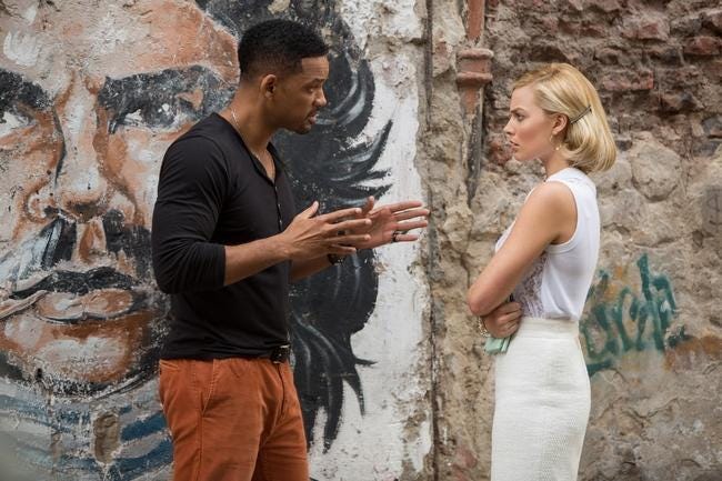 Will Smith and Margot Robbie star as con artists working a big score in "Focus." Warner Bros.