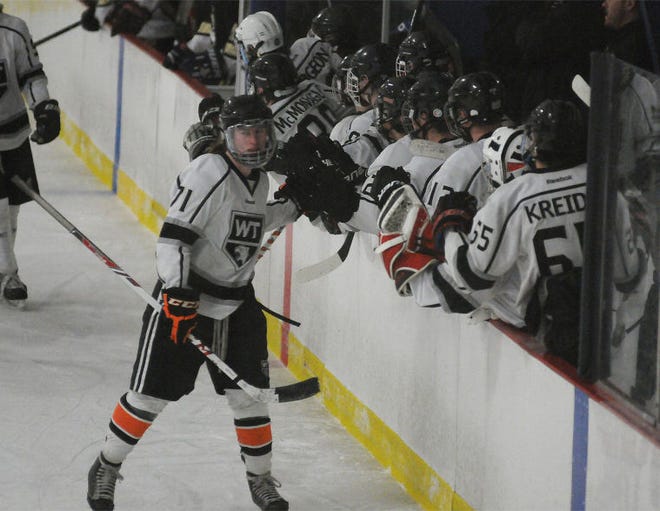 William Tennent's Alec Dugan (71) celebrates with teammates after he scored during their game against Harry S. Truman at the Bucks County Ice Sports Center in Warminster on Tuesday, March 3, 2015. Tennent won the game 5-0.