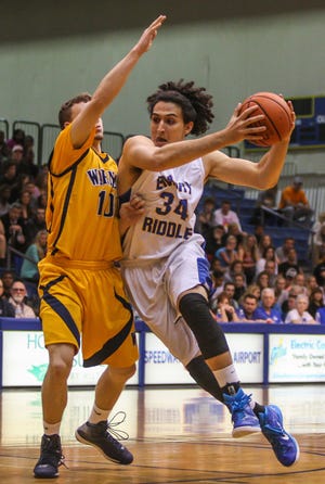 Embry-Riddle sixth-man Joe Gonzalez takes it to the basket against Warner on Monday. ERAU meets Southeastern at the ICI Center tonight in the Sun Conference Tournament title game.