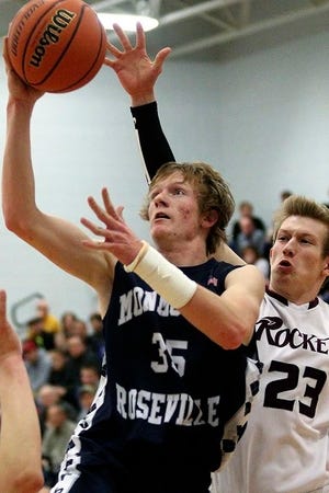 Monmouth-Roseville’s Braeden Wollbrink trys to get past Rockridge’s Isaiah Kistler for a layup during the IHSA Class 2A Sectional semifinal game in Farmington on Wednesday night. The Titans fell to the Rockets, 70-48. Monmouth-Roseville's season ends at 19-10.