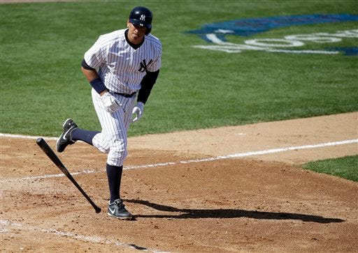 A-ROD BACK IN YANKEES LINEUP: The slugger, returning from a season-long drug suspension, hits a single in his first at-bat in a spring training game.