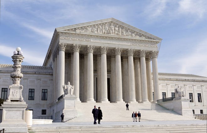 This Jan. 25, 2012, photo, shows the U.S. Supreme Court Building in Washington. The U.S. Supreme Court, during the week of March 2, 2015, hears a challenge to President Barack Obama's health care overhaul. If successful, the lawsuit would cripple Obama's prized domestic achievement, a program that has brought the U.S. as close as it has ever come to universal health care. The Affordable Care Act passed Congress in 2010 without a single Republican vote in favor. AP FILE PHOTO