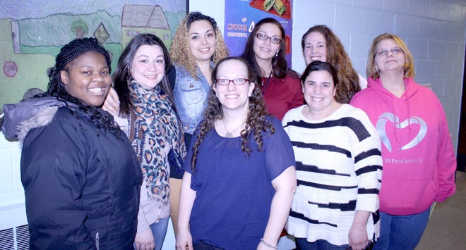Members of the Benjamin Cosor Elementary School PTA in Fallsburg, led by Rosalind Natale, front row center, are proud of the successful fundraiser they hosted. Photo by Larry Schafman