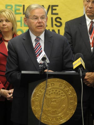 U.S. Senator Robert Menendez speaks at a press conference at the New Hanover School in 2014. On Friday, March 6, 2015, he denied any wrongdoing amid reports that he is the target of a federal grand jury investigation. FILE PHOTO