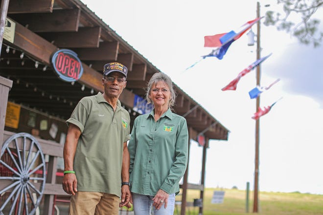 Lloyd Thorne, left, and Helen Shaut pose for a photo at The “Dam” Smoker BBQ in Eustis. Shaut and Thorne organize a cruise-in at the restaurant on the third Saturday of every month.