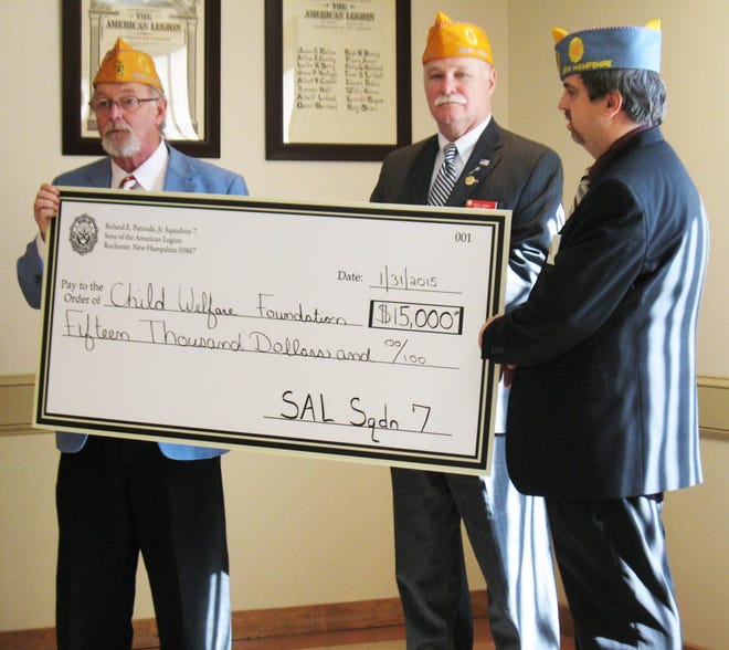 SAL Squadron 7 Commander Robert Hoitt presents a $15,000 check to NH SAL Department Commander Scott Merrill and National SAL Vice Commander Gregg “Doc” Gibbs.