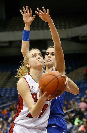 Shallowater's Kelsee Smith drives against Jarrell's Julie Tucker during their Class 3A state semifinal game on Thursday in San Antonio. (Shannon Wilson/AJ Media)