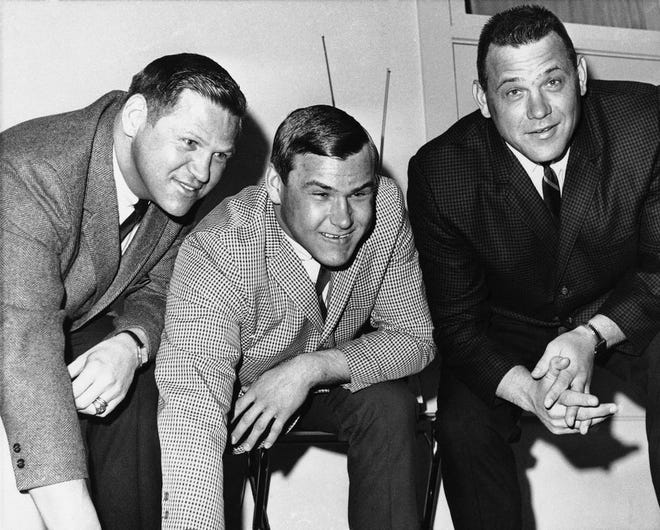 Gene Modzelewski, center, signed with the Cleveland Browns in Cleveland on Feb. 22, 1966 following in the footsteps of his two older brothers, Ed (Big Mo), at left, and Dick (Little Mo), at right, Ed died Saturday.