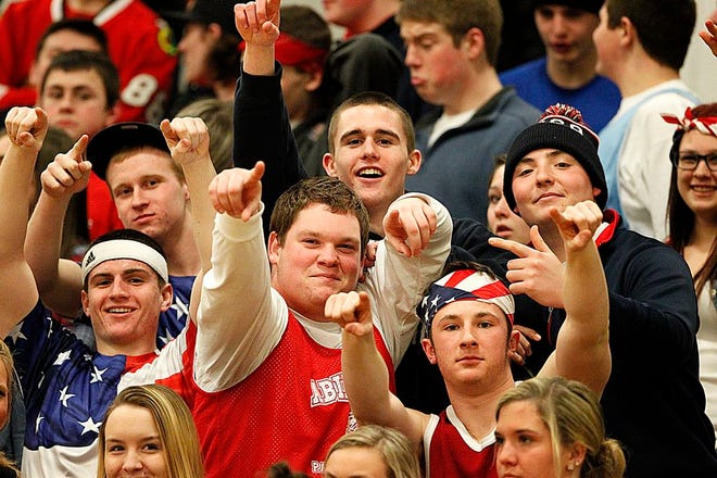 Abington Girls Basketball fans cheering on their team dressed in Red White and blue at at the Girls South Sectional Semi-Finals Tuesday, March 3, 2015.