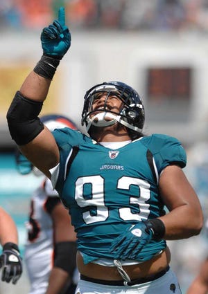 RICK WILSON/The Times-Union--9/12/10-- Jags #93 Tyson Alualu celebrates after sacking Denver QB #8 Kyle Orton at 4:34 in the 2nd quarter. The Jacksonville Jaguars played the Denver Broncos at EverBank Field in Jacksonville, FL on Saturday September 12, 2010.  (The Florida Times-Union, Rick Wilson)