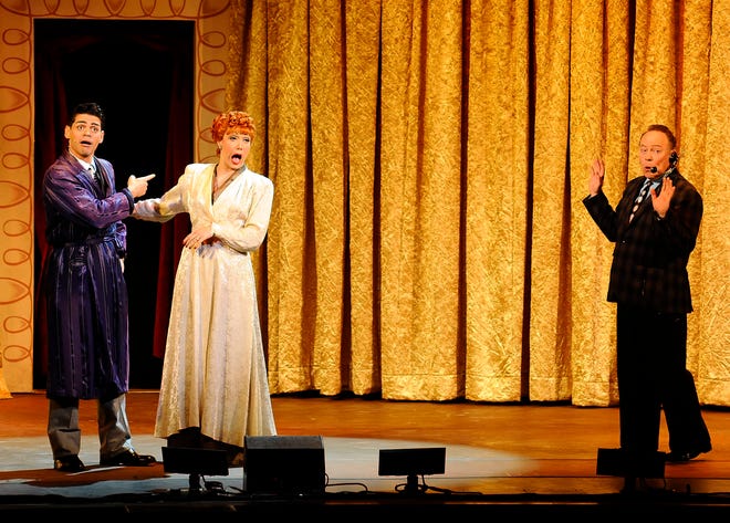 Euriamis Losada as Ricky Ricardo, Thea Brooks as Lucy Ricardo and Mark Christopher Tracy as the Desilu Playhouse Host perform in "I Love Lucy" Live on Stage at the Hanover Theatre on Friday.