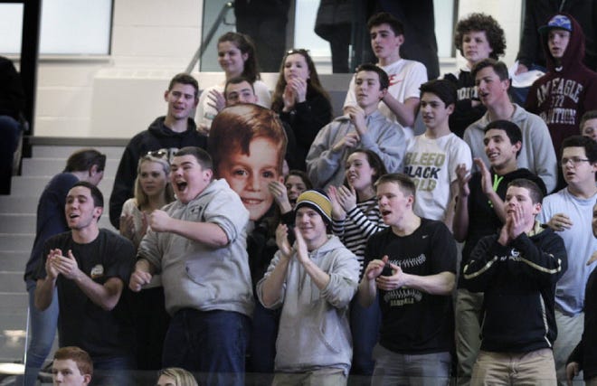 North Kingstown students cheer for their team on Sunday at Alumni Hall.