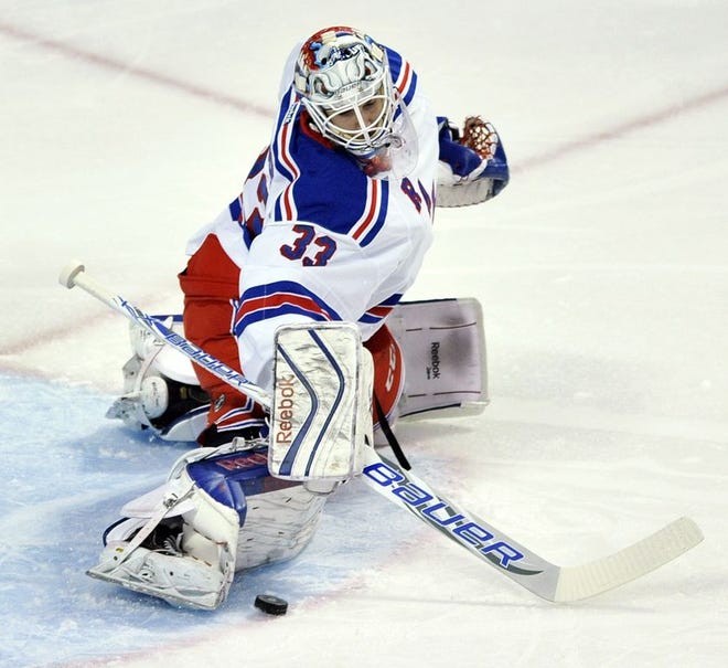 Rangers goalie Cam Talbot makes a save in the first period, one of 29 he made in the game. Talbot has five shutouts this season.