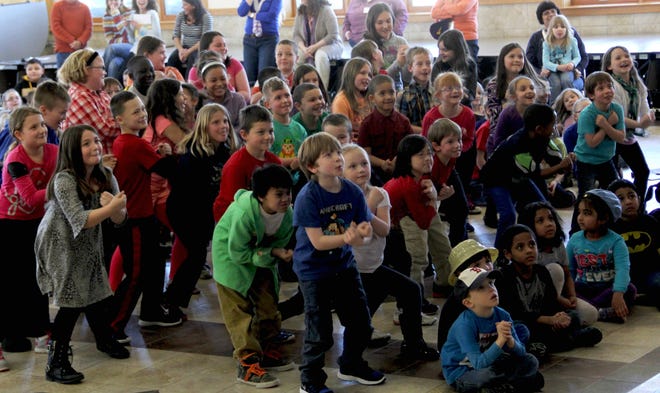 Students at the Idlehurst School in Somersworth break out into a Flash Mob Friday afternoon during a Community Day assembly.