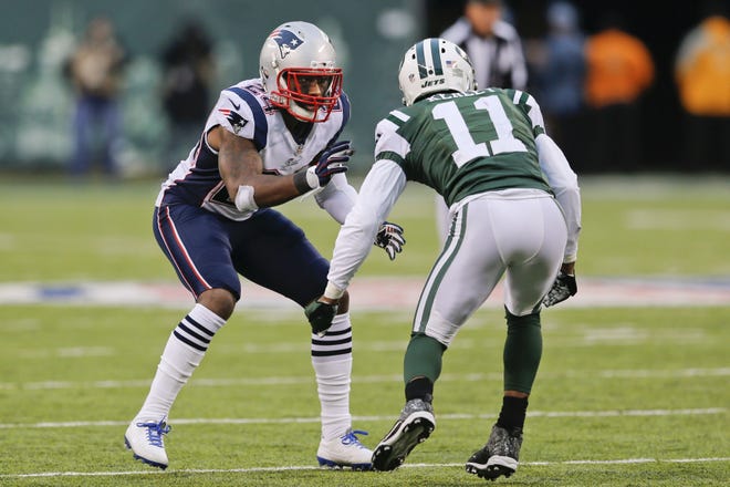 After helping the Patriots win the Super Bowl last season, cornerback Darrelle Revis (left) has reached a deal to return to the Jets, with whom he started his career. AP File Photo/Julio Cortez