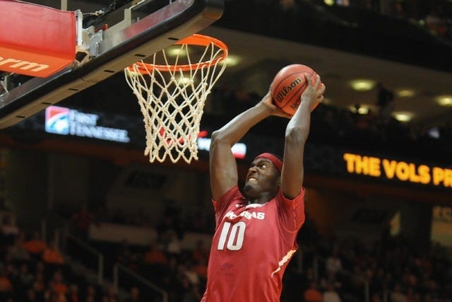 Jan 13, 2015; Knoxville, TN, USA; Arkansas Razorbacks forward Bobby Portis (10) dunks the ball against the Tennessee Volunteers during the game at Thompson-Boling Arena. Mandatory Credit: Randy Sartin-USA TODAY Sports 
 Feb 3, 2015; Fayetteville, AR, USA; Arkansas Razorbacks forward Bobby Portis (10) drives into South Carolina Gamecocks forward Michael Carrera (24) during a game at Bud Walton Arena. Arkansas defeated South Carolina 75-55. Mandatory Credit: Beth Hall-USA TODAY Sports